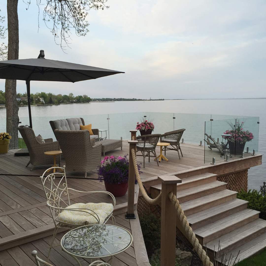 Frameless glass railing on a modern home balcony