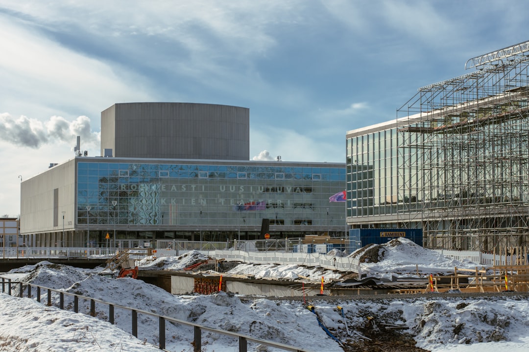 a large building with a lot of scaffolding around it - Photo by Aleksi Partanen on Unsplash