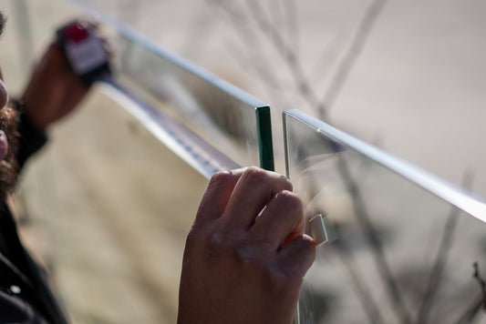 Working with Uneven Surfaces: Tips for Glass Railing Installation