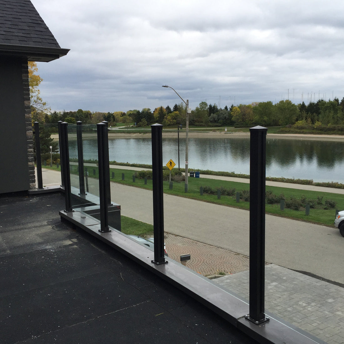 Maintaining Metal and Wood Components in Glass Railing Systems