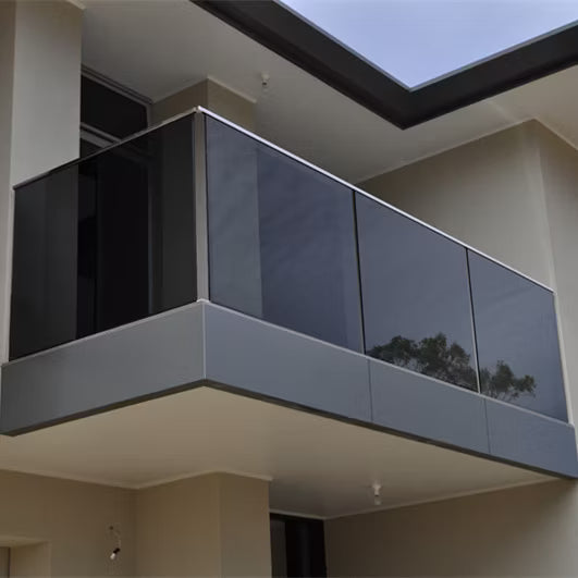 Modern Style Meets Privacy with Tinted and Frosted Glass Railings