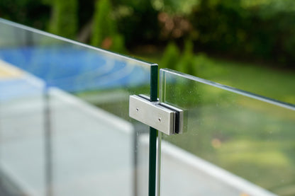 Two tempered glass panels joined inline by a brushed stainless connector