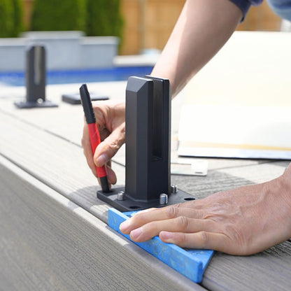 Matte black glass railing spigot from above showing the glass channel