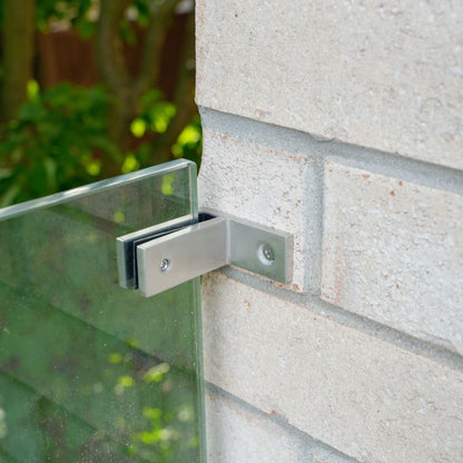 Brushed stainless steel wall-to-glass connector for 12mm frameless glass railing, front view